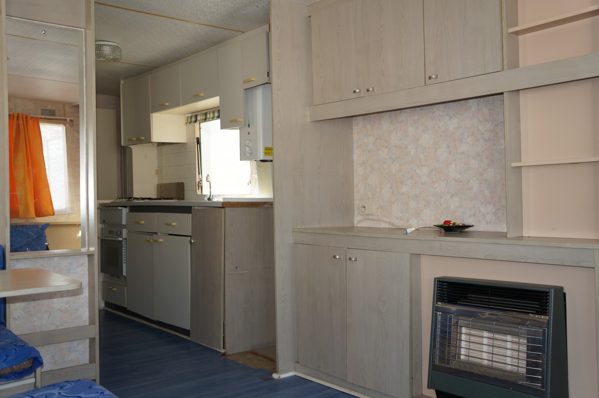 Chauffage gaz par catalyse dans le living du mobil home ABI Phoenix 28 1992