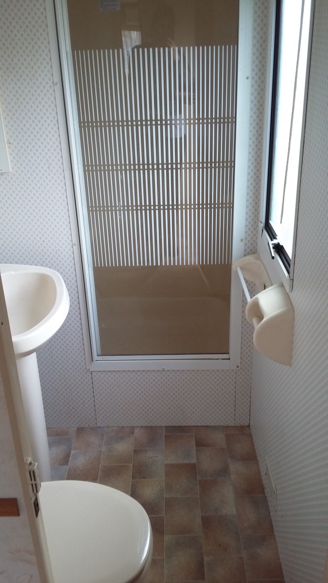 Salle de bain avec douche  mobil home occasion ABI Montrose 