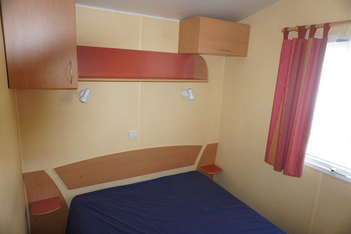Chambre parentale du mobil home occasion 2 chambres IRM Super Titania Confort 2004