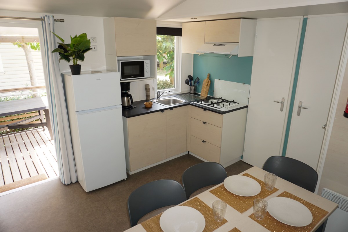 Pièce à vivre mobil home occasion IRM Super Titania 3 2019