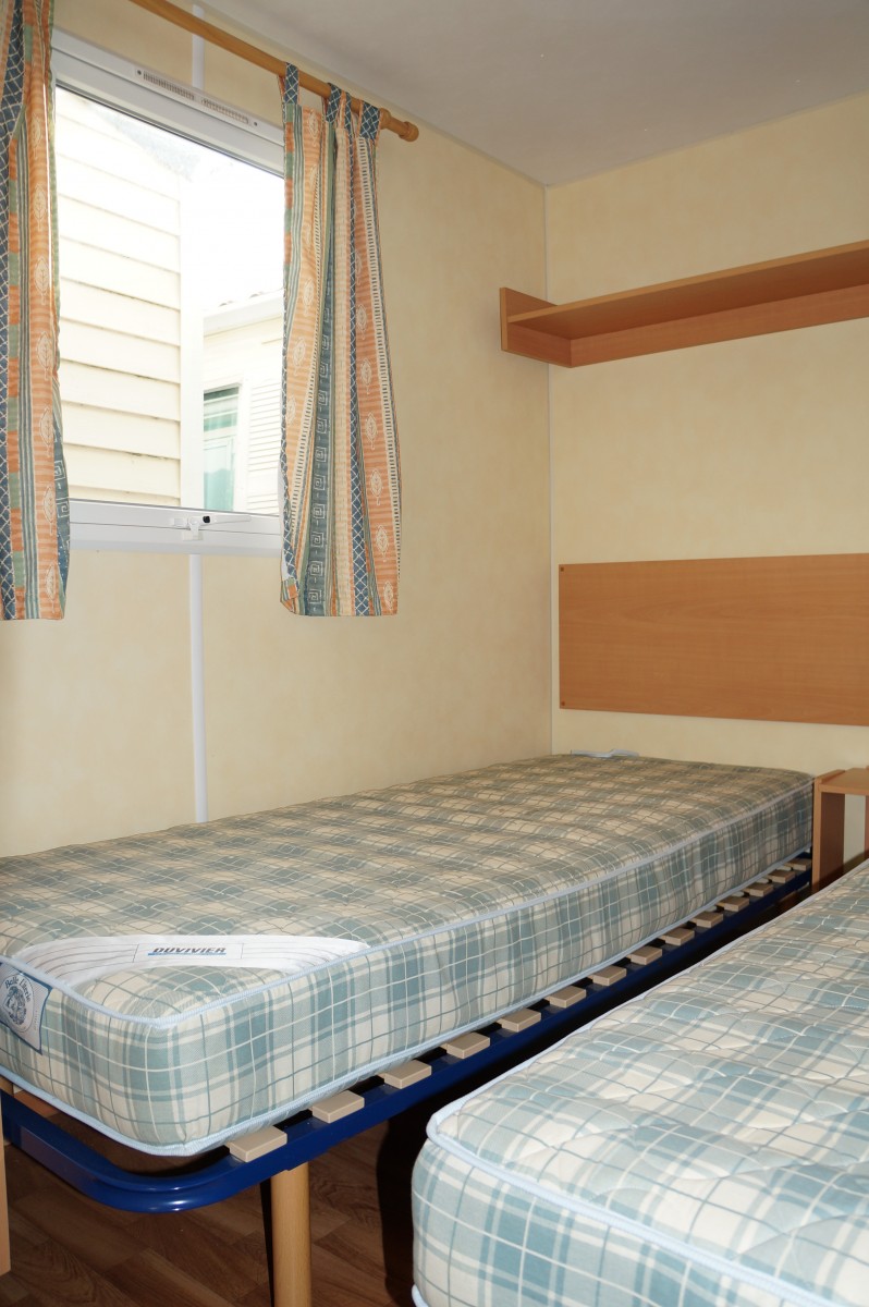 mobil home d'occasion IRM Super Mercure standard 2002 chambre enfants avec lits jumeaux